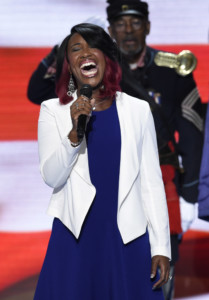 "Star" Swain sings the National Anthem onstage