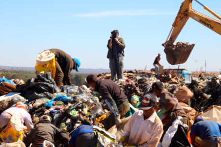 The closure of an old dump
threatens the livelihoods of thousands of people who survive on what they
can scavenge there. Lixão da Estrutural dump