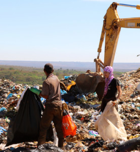 The closure of an old dump
threatens the livelihoods of thousands of people who survive on what they
can scavenge there. Lixão da Estrutural dump