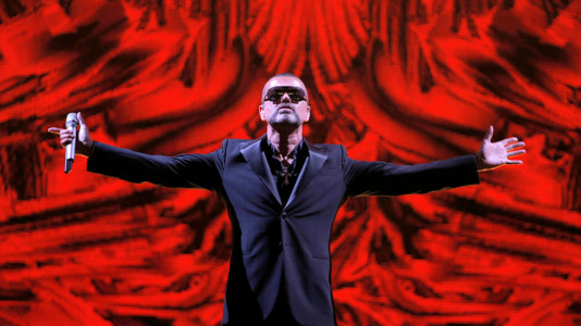 In this Sept. 9, 2012 file photo, British singer George Michael performs at a concert to raise money for the AIDS charity Sidaction, during the Symphonica tour at Palais Garnier Opera house in Paris, France. (AP Photo/Francois Mori, File)