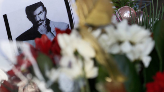 Tributes left outside the home of British musician George Michael in London, Monday, Dec. 26, 2016. George Michael, who rocketed to stardom with WHAM! and went on to enjoy a long and celebrated solo career lined with controversies, has died, his publicist said Sunday. He was 53. (AP Photo/Kirsty Wigglesworth)