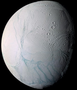 This June 28, 2009 image provided by NASA, taken by the international Cassini spacecraft, shows Enceladus, one of Saturn's moons. NASA's Cassini spacecraft has detected hydrogen molecules in the geysers shooting off the ice-encrusted ocean world, possibly the result of deep-sea chemical reactions between water and rock that could spark microbial life, according to findings announced Thursday, April 13, 2017 in the journal Science. (AP Photo/NASA)