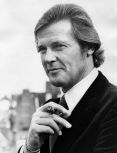 Roger Moore poses with a cigar at a press reception on Aug. 1, 1972 in London, after it was announced that he was chosen as the new James Bond. (PHOTO: AFP PHOTO / CENTRAL PRESS PHOTOS) Roger Moore