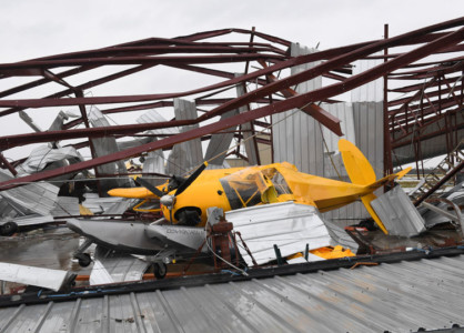 A badly damaged light plane in its hanger at Rockport Airport after heavy damage when Hurricane Harvey hit Rockport, Texas on August 26, 2017.
Hurricane Harvey slammed into the Texas coast late Friday, unleashing torrents of rain and packing powerful winds, the first major storm to hit the US mainland in 12 years. / AFP PHOTO / MARK RALSTON Hurricane Harvey Slams Into Texas Gulf Coast