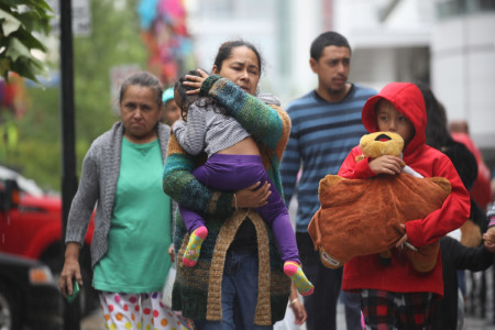 HOUSTON, TX - AUGUST 29: Evacuees arrive at the George R. Brown Convention Center after flood waters from Hurricane Harvey inundated the city on August 29, 2017 in Houston, Texas. The evacuation center which is overcapacity has already received more than 9,000 evacuees with more arriving. (Joe Raedle/Getty Images/AFP)