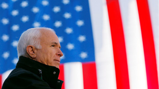 FILE PHOTO - U.S. Republican presidential nominee Senator John McCain (R-AZ) speaks at a campaign rally in Defiance, Ohio October 30, 2008. REUTERS/Brian Snyder/File Photo