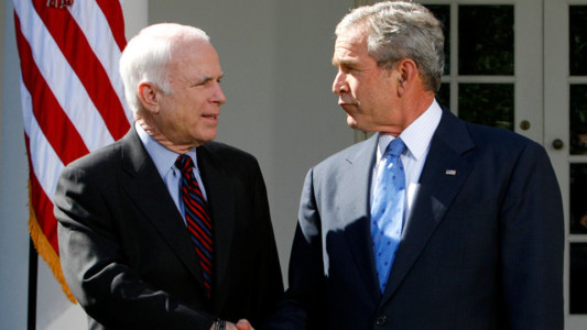 FILE PHOTO - U.S. President George W. Bush (R) and presumptive Republican presidential nominee Sen. John McCain shake hands after a meeting at the White House in Washington March 5, 2008. REUTERS/Kevin Lamarque/File Photo