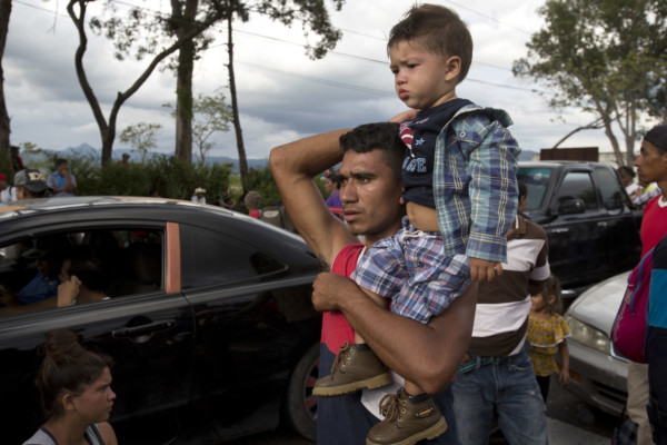 Honduran migrants making their way to the U.S. are blocked by Guatemalan police after crossing the Honduran border without incident, in Esquipulas, Guatemala, Monday, Oct. 15, 2018. (AP Photo/Moises Castillo) Honduran migrants making their way to the U.S. are blocked by Guatemalan police