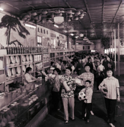 A photo in 1978 in Luoyang city, Henan Province shows residents shopping in a new Department store. (Source: published by Henan Daily via VCG)