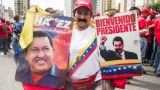 "President Maduro is a worker. He knows what is poverty and how the poor suffer. His heart is with the poor and I will continue voting for him." --Ana de Castellanos, wearing a costume of Maduro including a fake mustache, came from the State of Miranda two hours from Caracas. (Photo: Gindel Delgado)