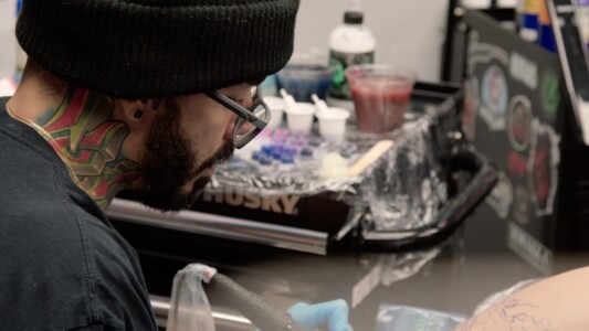 Chris Almeida, a Long Hauler, is a tattoo artist in Miami.